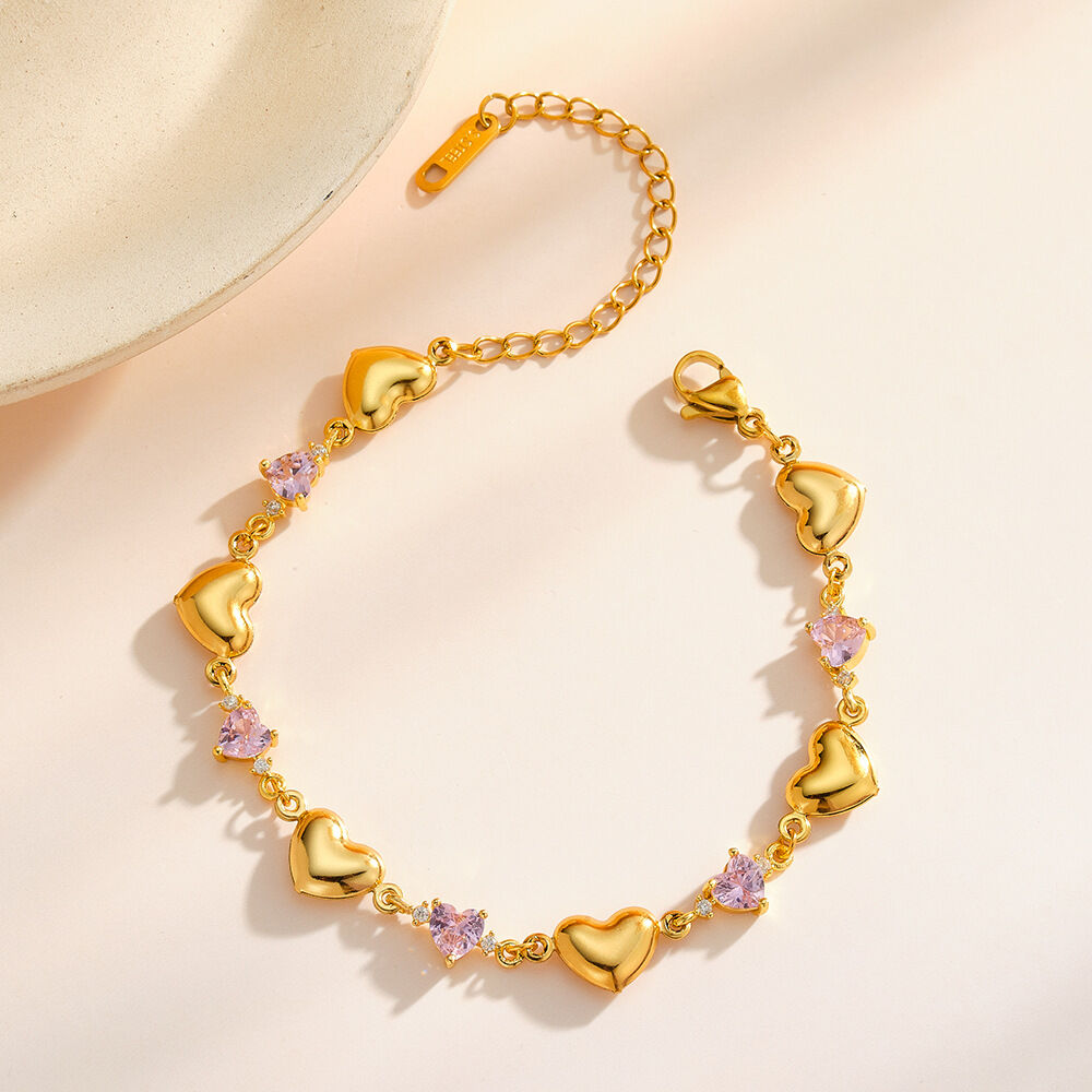 Pulseras de cadena para mujer de acero inoxidable con circonitas doradas, diseño de corazón patchwork y estilo romántico, resistentes al agua. Imagen3