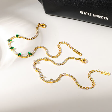 Eenvoudige luxe, dagelijkse, onregelmatig gevormde, waterdichte, roestvrijstalen damesarmband met goudkleurige zirkonia.