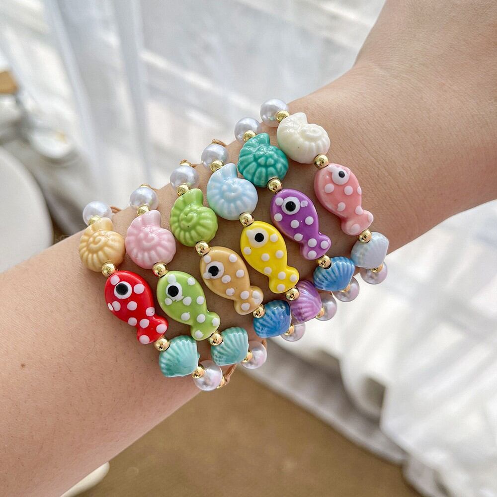 Bracelets pour femmes en corde tressée ornée de coquillages, style océanique mignon, avec perles.