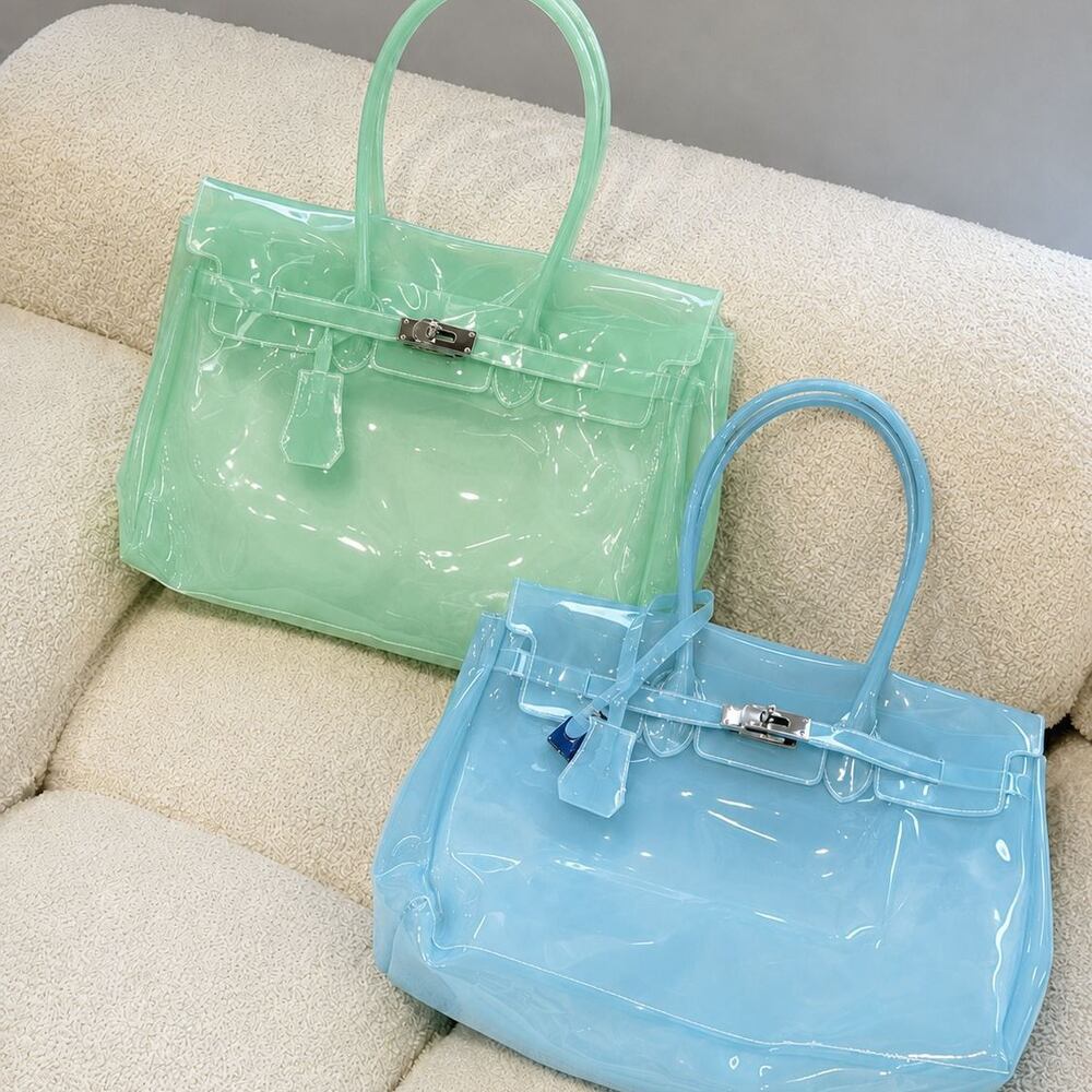 Sac carré femme en PVC transparent uni avec détails métalliques et fermetures métalliques, style décontracté. Image3