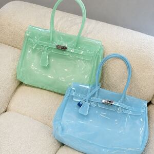 Sac carré femme en PVC transparent uni avec détails métalliques et fermetures métalliques, style décontracté. h5 Image3