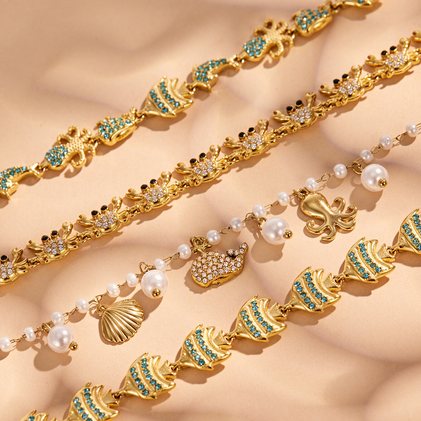 Urlaubs-Tier-Ozean-Stil Edelstahl wasserdicht goldfarben Zirkon Damen-Kettenarmbänder