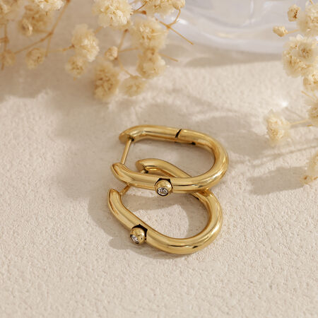 Orecchini a cerchio da donna in acciaio inossidabile impermeabile color oro con zirconi.