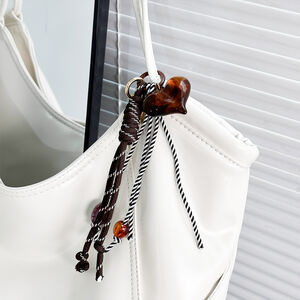 Ethnic Series Casual Flower Letter Devil's Eye Sun Bow Knot Leopard Print Tassel Beads Star Resin Bag Charms h5 Picture2