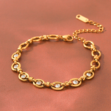 Waterdichte roestvrijstalen damesarmbanden met goudkleurige zirkonia.
