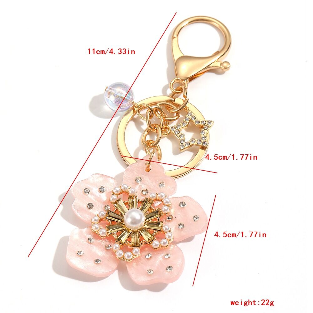 Llavero de cobre con forma geométrica de estrella tejida, corazón y flores de la serie Luxury Series Casual, con cuentas de colores variados y diseño casual. h5Imagen3