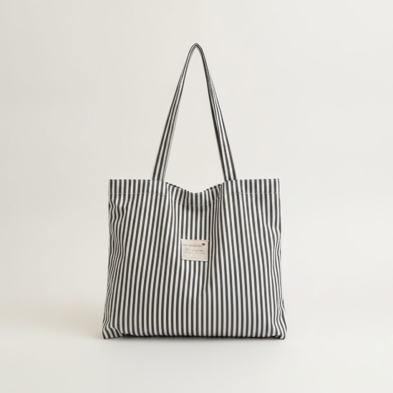 Lässige, quadratische Damen-Tasche aus Canvas mit Streifenmuster und ohne Buchstaben. Bild2