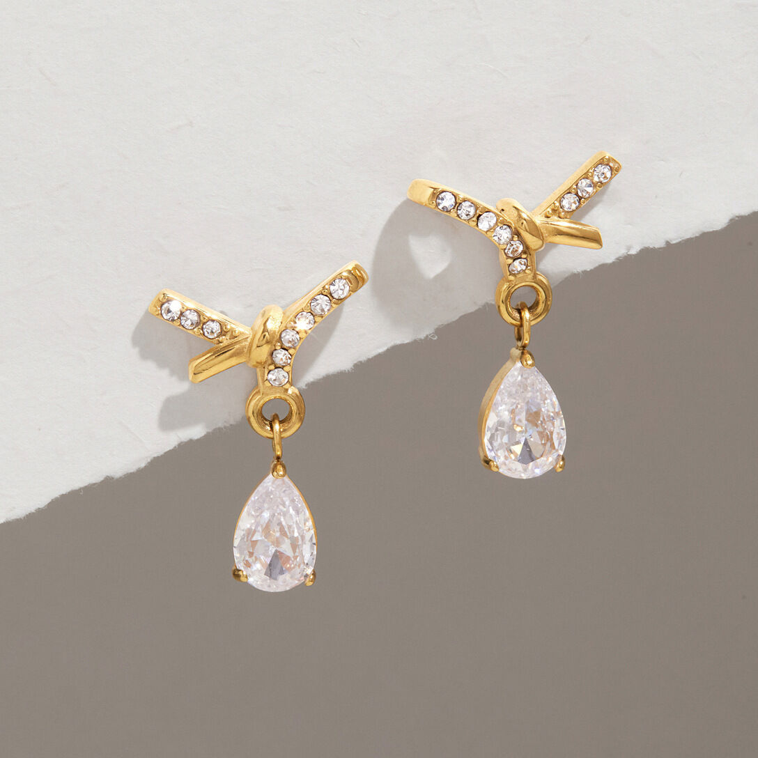 Orecchini pendenti da donna con fiocco, in acciaio inossidabile, impermeabili, color oro, con strass e zirconi.