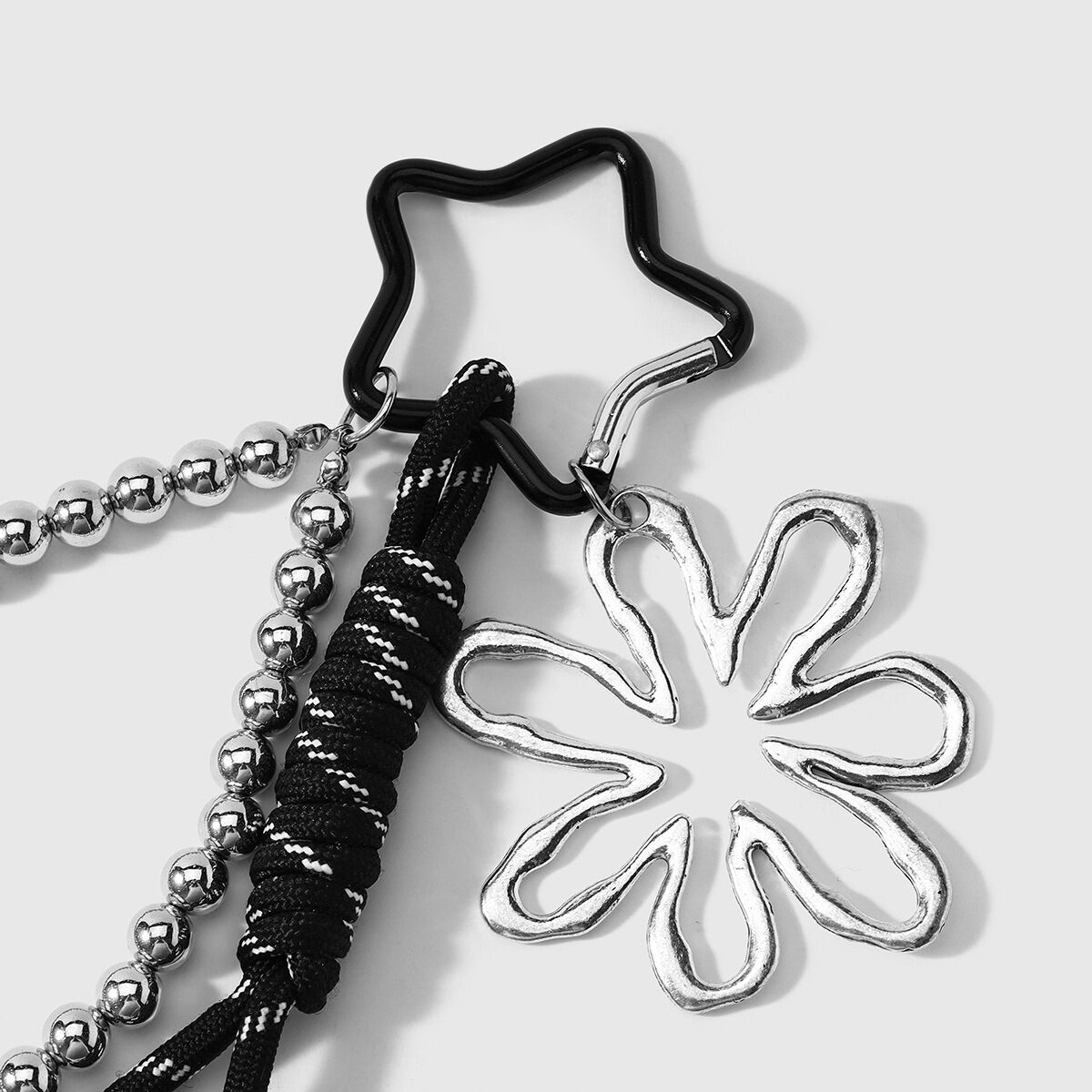 Llaveros De Aleación Con Forma De Estrella Calada Y Diseño Floral Diario, De La Serie Simple. h5 Imagen5