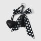 One black and white heart-shaped keychain