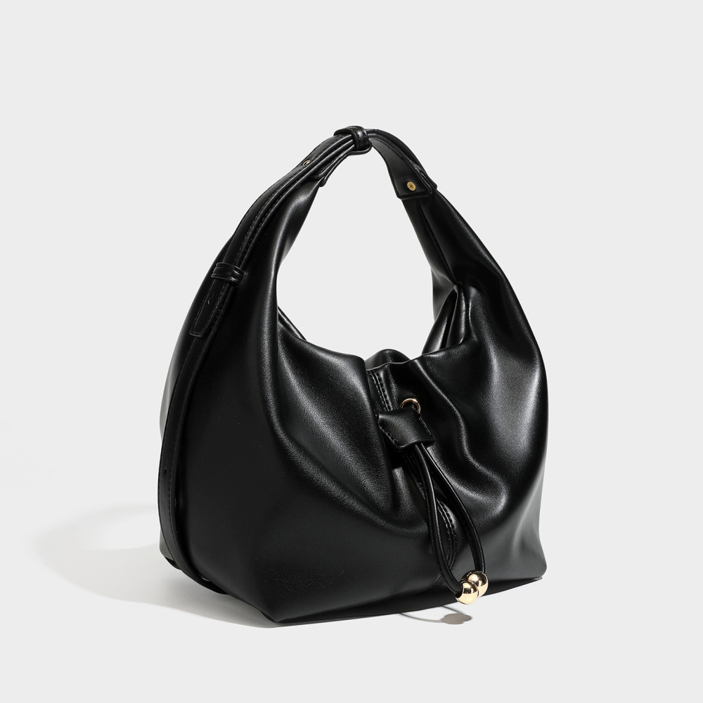 Casual Style Metal Hardware Solid Color Pu Women's Round Handbags