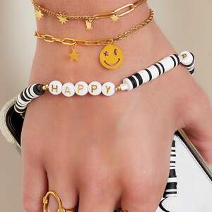 Pulsera de acero inoxidable con charms de estrella. h5 Imagen3